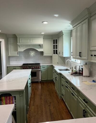 Modern kitchen featuring a sage green