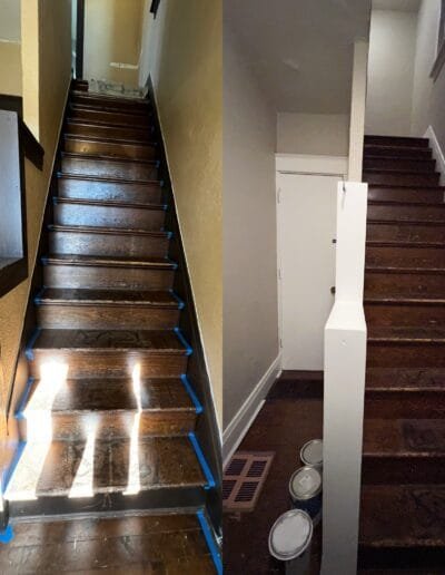 Wooden staircase repainted with glossy white trim