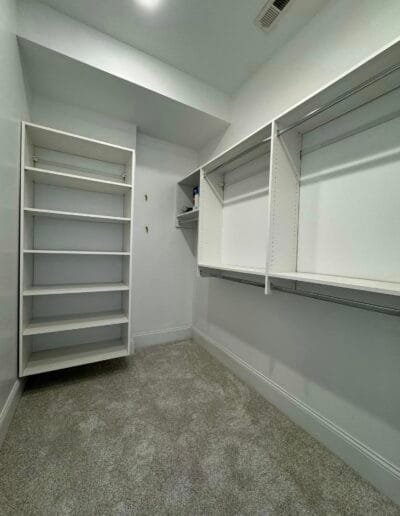 Walk-in closet interior repainted with light tones