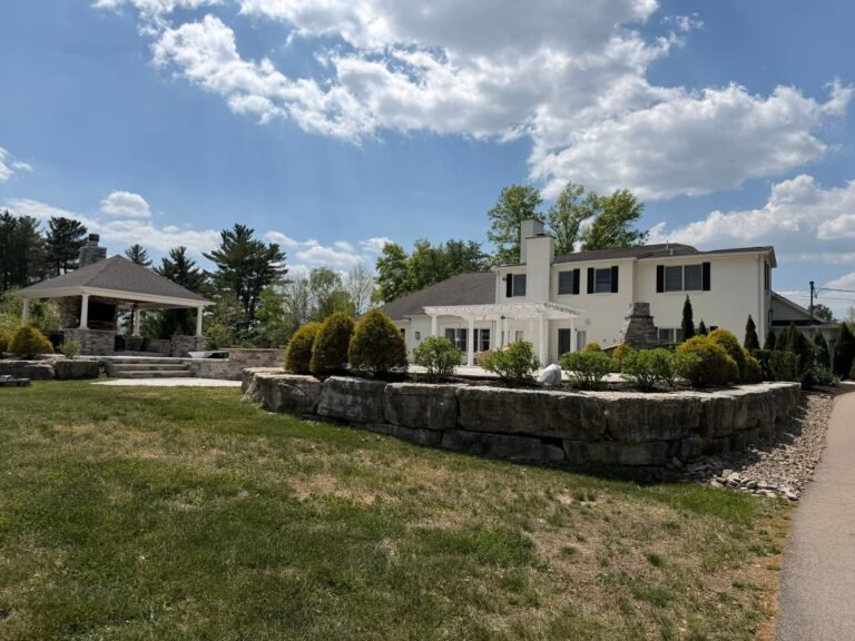 Rear elevation and covered pavilion of the Indian Hill, OH property after exterior painting